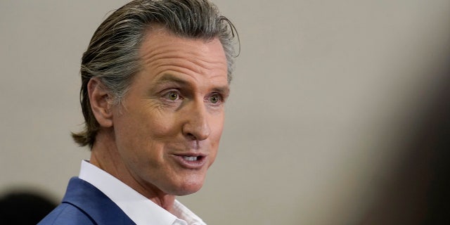 Newsom smirks