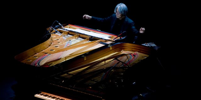 FILE - Maestro Ryuichi Sakamoto performs at Rome's Auditorium, Wednesday, Oct. 28, 2009.  Japan's recording company Avex says Sakamoto, a musician who scored for Hollywood movies such as "The Last Emperor" and "The Revenant," has died. He was 71. He died March 28, according to the statement released Sunday, April 2, 2023.