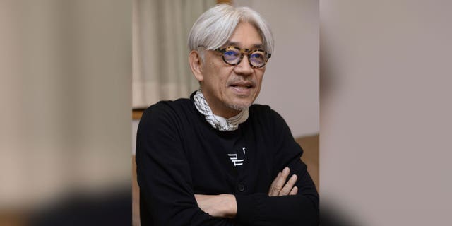 Ryuichi Sakamoto speaks in an interview in Tokyo, Japan, March, 2017.  Japan's recording company Avex says Sakamoto, a musician who scored for Hollywood movies such as "The Last Emperor" and "The Revenant," has died. He was 71. He died March 28, according to the statement released Sunday, April 2, 2023.