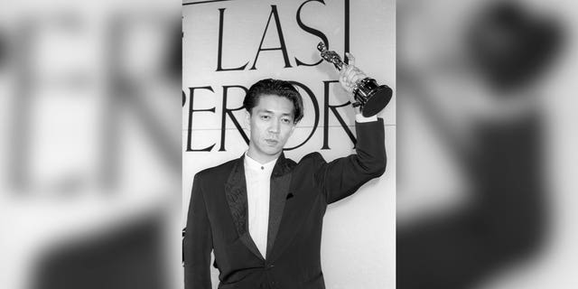 Ryuichi Sakamoto holds the trophy after he won the Academy composition award for "The Last Emperor" in Tokyo, Japan, April, 1988.   Japan's recording company Avex says Sakamoto, a musician who scored for Hollywood movies such as "The Last Emperor" and "The Revenant," has died. He was 71. He died March 28, according to the statement released Sunday, April 2, 2023.