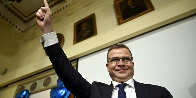 The National Coalition party Chairman Petteri Orpo celebrates with supporters at the party's parliament election party at the Ostrobotnia club in Helsinki, Finland on Sunday, April 2, 2023.