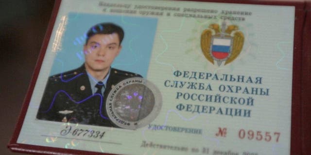 This photo provided by the Dossier Center shows the Russian Federal Protective Service identification card of Gleb Karakulov in October 2022 in Turkey.