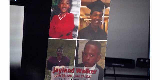 A poster that appeared at the funeral service for Jayland Walker at the Akron Civic Center in Ohio, on July 13, 2022. A jury in Ohio will hear evidence this week to decide whether officers should face criminal charges in the shooting of Walker.