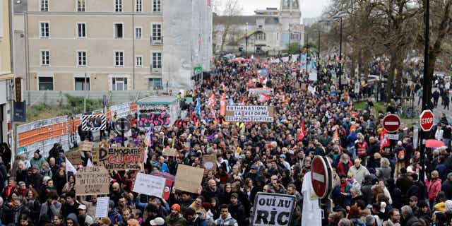 Demonstrators march on April 6, 2023 in Nantes, France. Thousands of people are expected to fill the streets of France on Thursday for the 11th day of nationwide resistance to a government proposal to raise the country's retirement age.