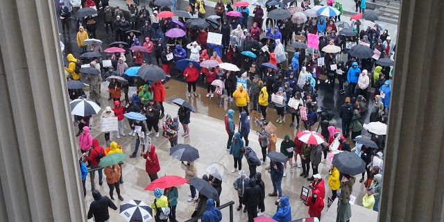 Protesters gather outside the state Capitol on April 6, 2023, in Nashville, Tenn., to demand gun law reform and to support three House Democrats up for expulsion for using a bullhorn to shout support for pro-gun control protesters in the House chamber.