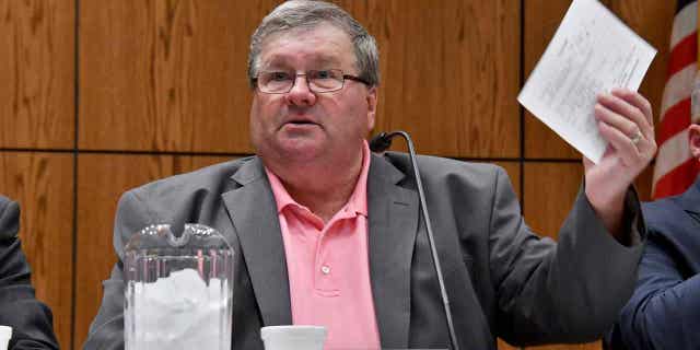 Rick Johnson chairs the Michigan medical marijuana licensing board as it meets before a capacity crowd in Lansing, Michigan, on June 26, 2017. Federal authorities said on April 6, 2023, that Johnson accepted more than $100,000 in bribes and agreed to plead guilty.