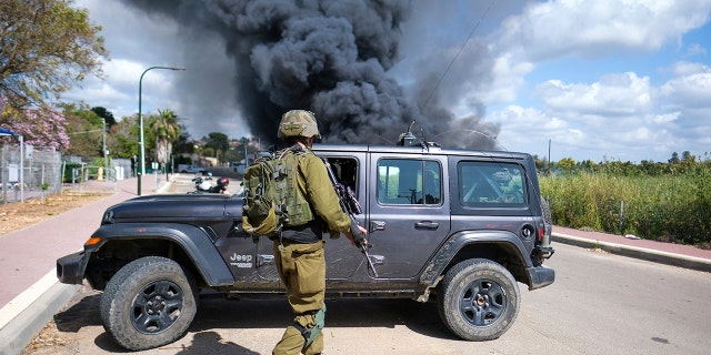 Smoke rises from a fire after rockets fired from Lebanon struck Bezet, northern Israel, Thursday, April 6, 2023. 