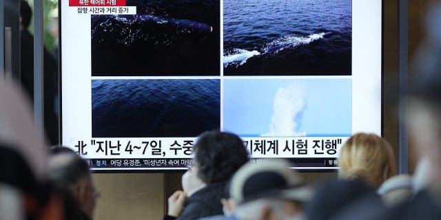 A TV screen shows a recent combination of images released by Pyongyang's official Korean Central News Agency during a news program at the Seoul Railway Station in Seoul, South Korea, Saturday, April 8, 2023. North Korea on Saturday claimed it tested this week a second known type of nuclear-capable underwater attack drone designed to destroy naval vessels and ports, adding to a flurry of weapons demonstrations this year that have heightened tensions with rivals.