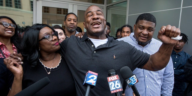 Lydell Grant, center, was released from prison on Nov. 26, 2019, after new evidence cleared him in a 2010 fatal stabbing. 