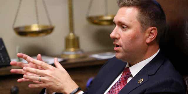 District 12 District Attorney Matt Ballard speaks at the Rogers County Courthouse on May 4, 2016. An Oklahoma man convicted of murder for fatally stabbing another man could get a new trial after Ballard acknowledged in a court filing on March 17, 2023, that two former prosecutors watched jurors deliberate via a video feed into the courtroom. 