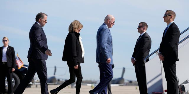 President Joe Biden walks to board Air Force One, Tuesday, April 11, 2023, with his son Hunter Biden, left, and sister Valerie Biden at Andrews Air Force Base, Md.
