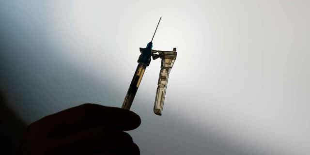 A syringe is prepared at a clinic in Norristown, Pennsylvania, on Dec. 7, 2021. The EPA proposed on April 11, 2023, to limit the use of the chemical ethylene oxide after finding higher than expected cancer risk at facilities that use it to sterilize medical devices.
