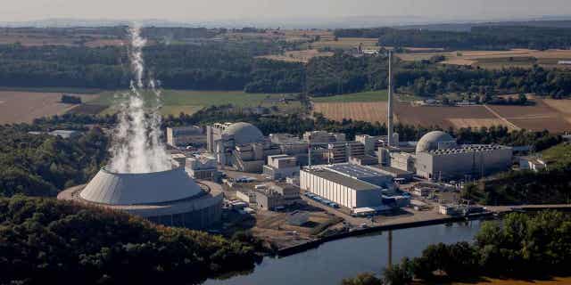 Water vapor rises from the cooling tower of a nuclear power plant in Neckarwestheim, Germany, on Aug. 22, 2022. The German government has dismissed calls on April 12, 2023, for a last-minute delay of the shutdown of the country's last three nuclear power plants. The shutdown is scheduled for April 15, 2023.
