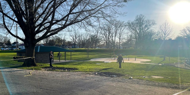 Officers guard the scene of a shooting that broke out during a memorial at McCormick Park on Wednesday, April 12, 2023, in Fort Wayne.
