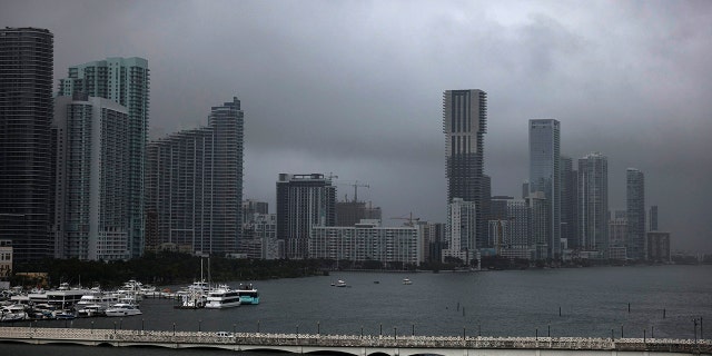 A haze sets over the city during a rainstorm, Wednesday, April 12, 2023, in Miami. 