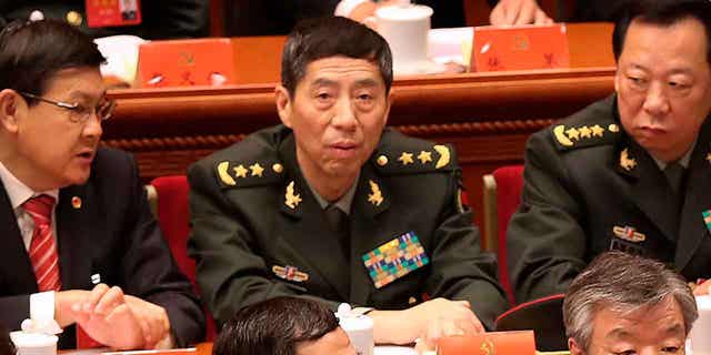 Chinese Defense Minister Gen. Li Shangfu, center, attends a ceremony at the Great Hall of the People in Beijing, on Oct. 18, 2017. Shangfu plans to visit Moscow next week for meetings with his Russian counterpart Sergei Shoigu and other military officials.