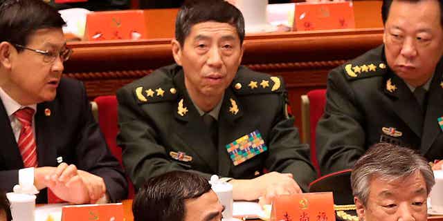 Chinese Defense Minister Gen. Li Shangfu, center, attends a ceremony at the Great Hall of the People in Beijing, on Oct. 18, 2017. Shangfu plans to visit Moscow next week for meetings with his Russian counterpart Sergei Shoigu and other military officials.