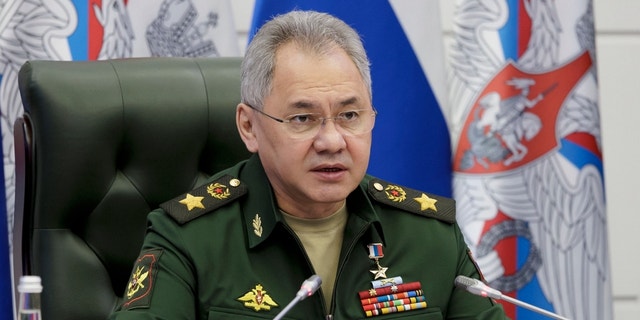 In this handout photo released by Russian Defense Ministry Press Service, Russian Defense Minister Sergei Shoigu speaks during a meeting with high level officers in Moscow, Russia, Friday, April 14, 2023.