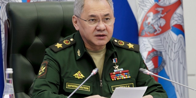 In this handout photo released by Russian Defense Ministry Press Service, Russian Defense Minister Sergei Shoigu speaks during a meeting with high level officers in Moscow, Russia, Friday, April 14, 2023.