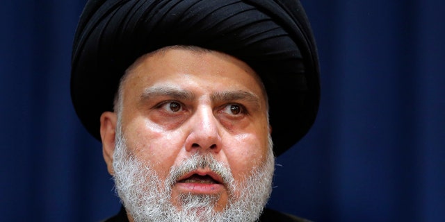 Influential Shiite cleric Muqtada al-Sadr makes a speech from his house in Najaf, Iraq, Tuesday, Aug. 30, 2022.