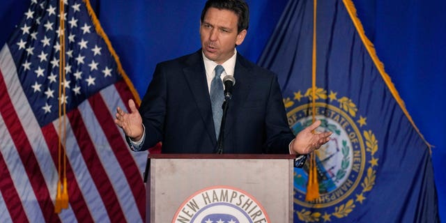 DeSantis speaking at a podium