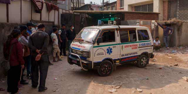 An ambulance carrying the dead body of Noel Richmond, a 56-year-old Irish climber, brought from Annapurna mountain region is seen in Kathmandu, Nepal, on April 18, 2023.