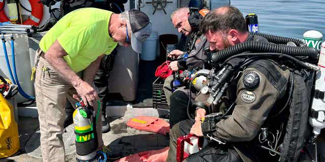 The team prepares to find the wreck of the 92-foot attack submarine Defender, on April 14, 2023. The Defender was found on April 23, 2023, by a dive team led by Richard Simon, a commercial diver from Connecticut.