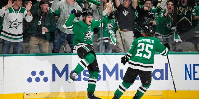 Roope Hintz celebrates scoring a goal agains the Wild