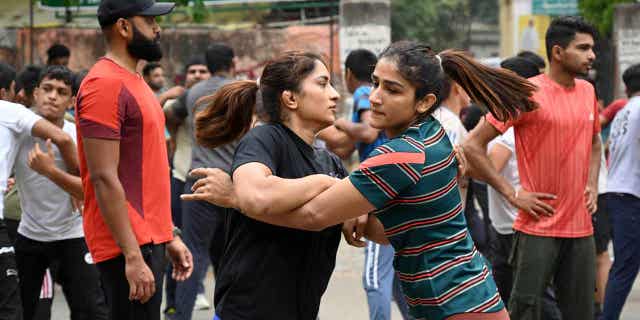 Indian wrestlers Vinesh Phogat,
