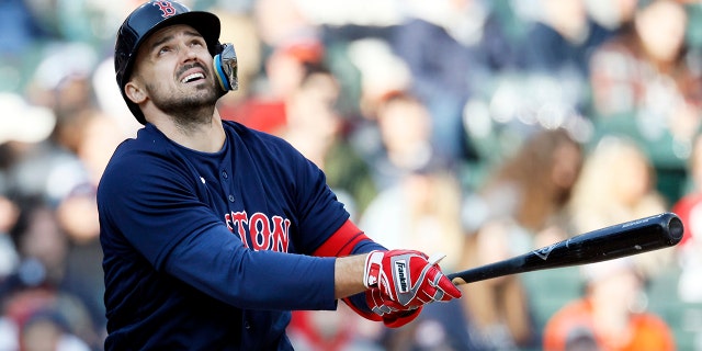 Adam Duvall #18 of the Boston Red Sox hits a double against the Detroit Tigers during the eighth inning at Comerica Park on April 8, 2023 in Detroit, Michigan. Duval scored on a single by Alex Verdugo.