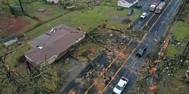 Damage to homes on E. Kiehl Ave. can be seen after a tornado caused extensive damage in the area Friday, March 31, 2023, in Sherwood, Arkansas.