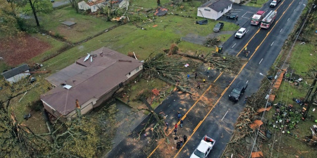 Damage to homes on E. Kiehl Ave. can be seen after a tornado caused extensive damage in the area Friday, March 31, 2023, in Sherwood, Arkansas.