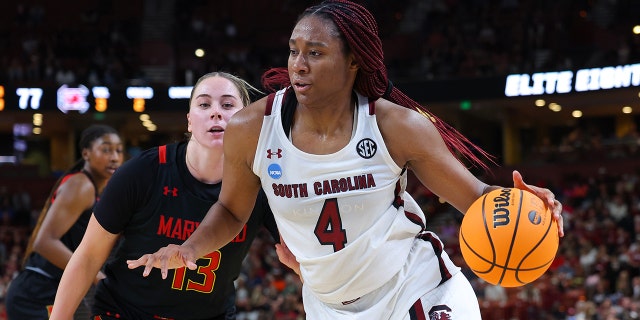 Aliyah Boston #4 of the South Carolina Gamecocks drives to the basket against the Maryland Terrapins during the fourth quarter of the Elite Eight round of the NCAA Women's Basketball Tournament at Bon Secours Wellness Arena on March 27, 2023 in Greenville, SC South.