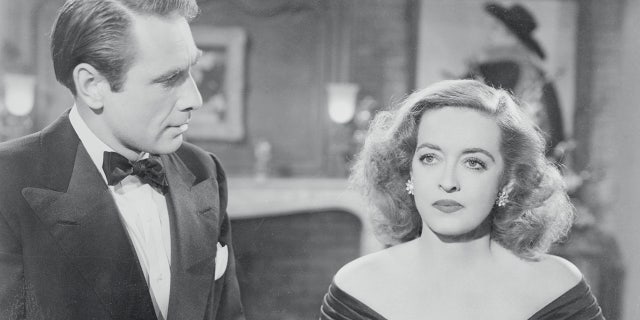 Davis' real-life husband Gary Merrill, who played Bill Sampson, and Bette Davis, as Margo Channing, are seen here in the classic film "All About Eve."