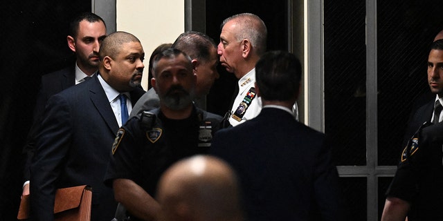 Manhattan District Attorney Alvin Bragg arrives at the courtroom at the Manhattan Criminal Court in New York on April 4, 2023, before former US President Donald Trump's hearing. Trump is charged with 34 felony counts of falsifying business records stemming from three pre-election hush-money cases, prosecutors said. 