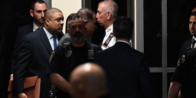 Manhattan District Attorney Alvin Bragg arrives at the courtroom at the Manhattan Criminal Court in New York on April 4, 2023, before former US President Donald Trump's hearing. Trump is charged with 34 felony counts of falsifying business records stemming from three pre-election hush-money cases, prosecutors said. 