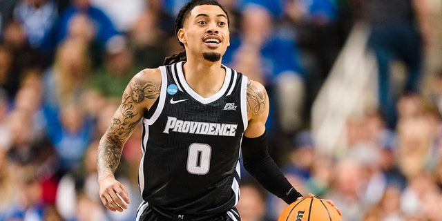 Alyn Breed of the Providence Friars brings the ball up court against the Kentucky Wildcats during an NCAA Men's Basketball Tournament game on March 17, 2023, in Greensboro, North Carolina.
