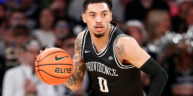 Alyn Breed of the Providence Friars dribbles during Connecticut Huskies game at Madison Square Garden on March 9, 2023.