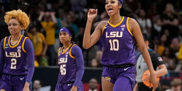 LSU's Angel Reese waves goodbye after Iowa's Monika Czinano fouls out during the second half of the NCAA Women's Final Four championship basketball game Sunday, April 2, 2023, in Dallas.