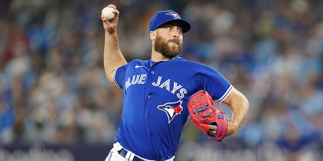 Anthony Bass of the Toronto Blue Jays pitches during the game between the Detroit Tigers and the Toronto Blue Jays at the Rogers Center on Tuesday, April 11, 2023 in Toronto, Canada.