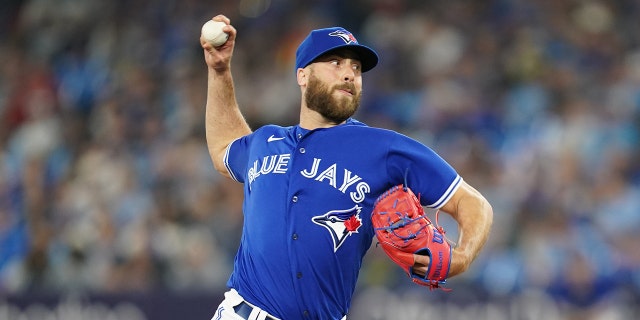 Anthony Bass of the Toronto Blue Jays throws during the game between the Detroit Tigers and the Toronto Blue Jays at the Rogers Center on Tuesday, April 11, 2023 in Toronto, Canada.