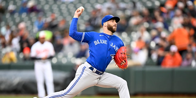 Anthony Bass, #52 of the Toronto Blue Jays, throws against the Baltimore Orioles during the second game of a doubleheader at Oriole Park at Camden Yards on October 5, 2022 in Baltimore.