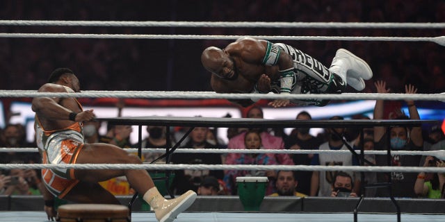 Apollo Crews dives into table