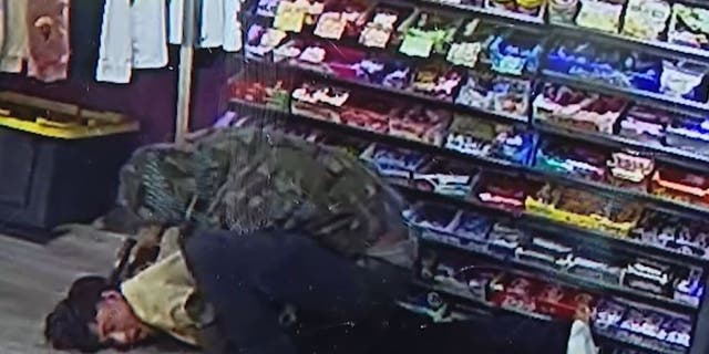 An armed man stormed into a Glendale, Arizona and tackled an armed employee