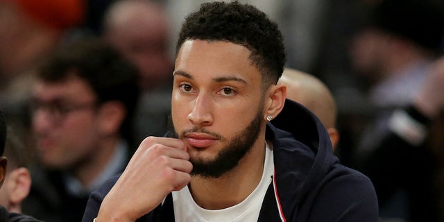 Injured Brooklyn Nets guard Ben Simmons watches from the bench during the New York Knicks game at Madison Square Garden on March 1, 2023.