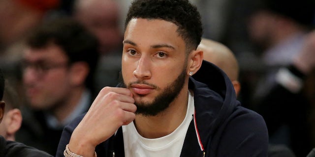 Injured Brooklyn Nets guard Ben Simmons watches from the bench during the New York Knicks game at Madison Square Garden on March 1, 2023.