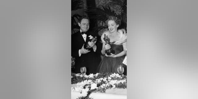 Bette Davis won the Academy Award for Best Actress two times; she's seen here at the 1939 Academy Awards with actor Spencer Tracy. They won the Best Actor and Best Actress Oscars that year.