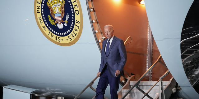 President Biden steps off Air Force One at Belfast International Airport in Northern Ireland on Tuesday night.
