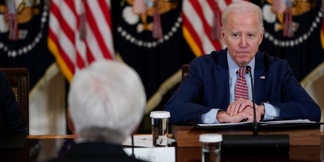 President Biden attends a meeting with the President's Council of Advisors on Science and Technology in the State Dining Room of the White House, Tuesday, April 4, 2023, in Washington. 