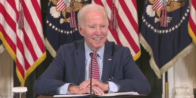 President Biden snickered at a question on former President Trump's indictment.